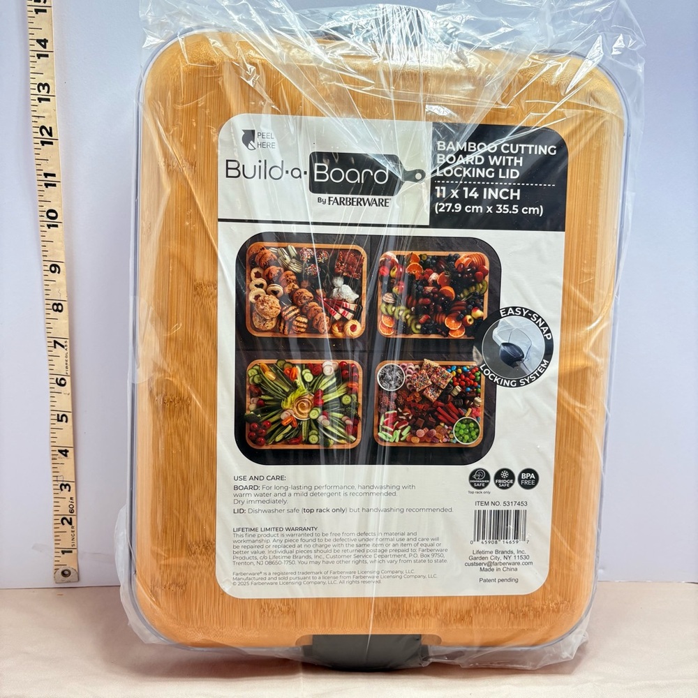 Farberware bamboo cutting board with locking Lid. Best for charcuterie serving
